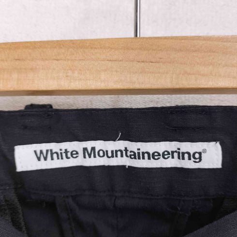 ホワイトマウンテニアリング WHITE MOUNTAINEERING 3TUCK TAPERED STRETCH PANTS 3タック テーパード ストレッチ パンツ メンズ JPN:2