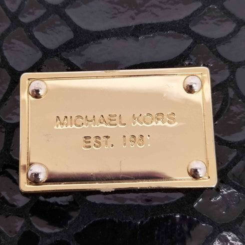 マイケルコース Michael Kors ロゴプレート エナメル パイソン クラッチウォレット レディース