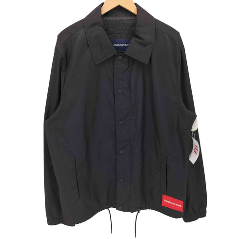 カルバンクラインジーンズ Calvin Klein Jeans バックロゴプリント ナイロン コーチジャケット メンズ import:L