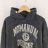ノーマニュアル NOMANUAL LAYERED ARCH GRAPHIC HOODIE レイヤード アーチ グラフィック フーディー メンズ L