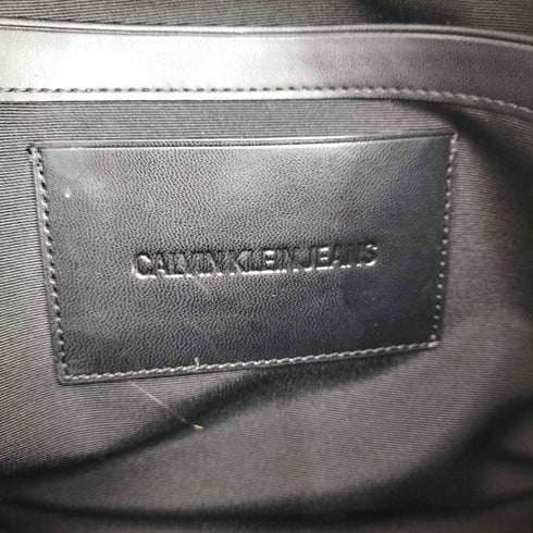 カルバンクラインジーンズ Calvin Klein Jeans 総柄 フェイクレザー ミディアム トラベル ポーチ メンズ