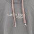 カルバンクラインジーンズ Calvin Klein Jeans スタッズテキスト プルオーバーパーカー レディース JPN:XL