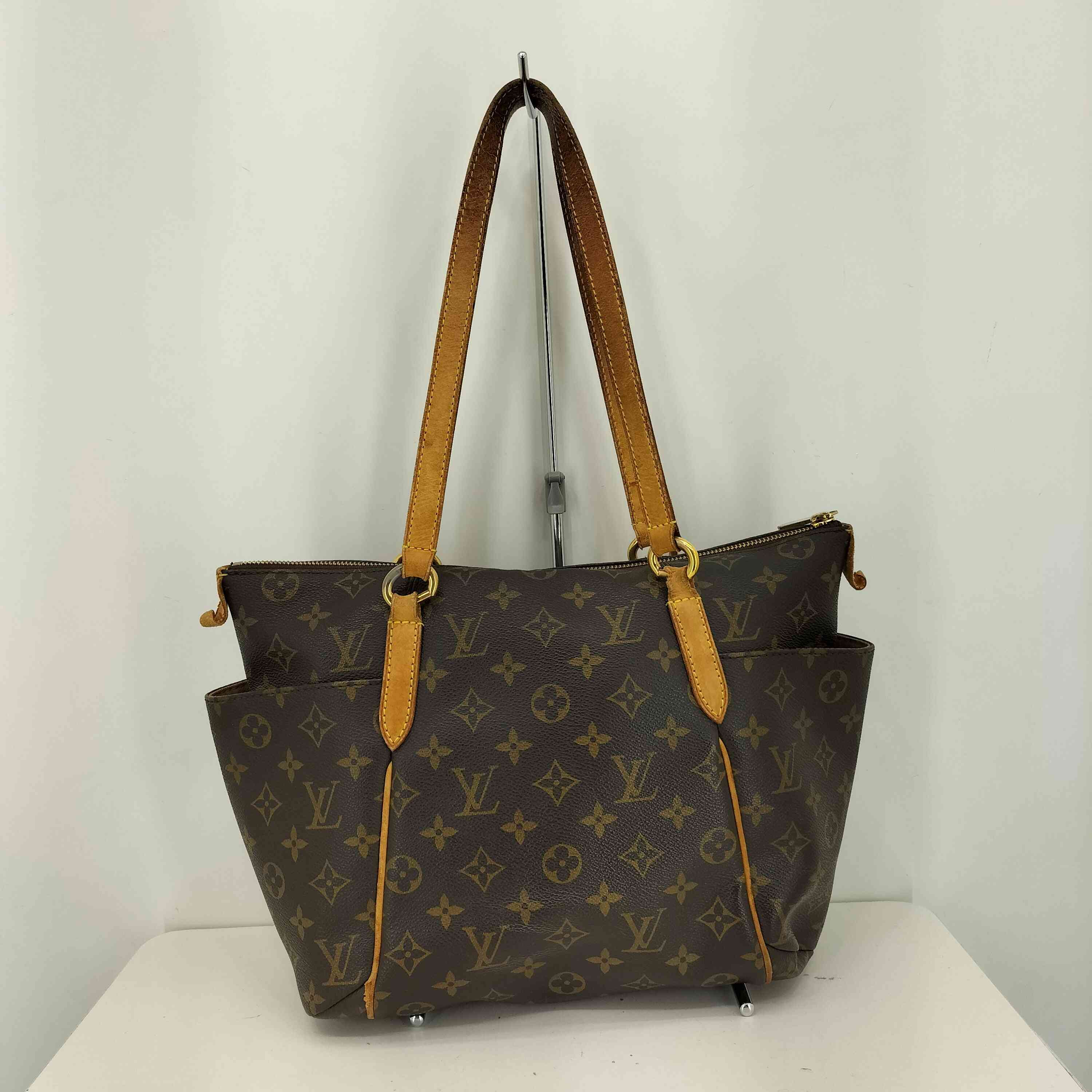 LOUIS VUITTON トータリーPM トートバッグ モノグラム　ロゴ総柄 LOUIS VUITTON トータリーPM トートバッグ モノグラムロゴ総柄